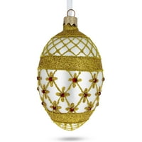 Zlatne zvijezde na staklu ornamentu za staklene jajole Trellis